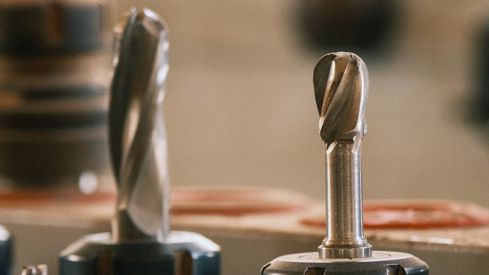 Carbide end mills and drills seated in tool holders